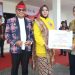 Bupati Safitri Berikan Bantuan dan Menyerahkan Penghargaan Desa Bersih Narkoba