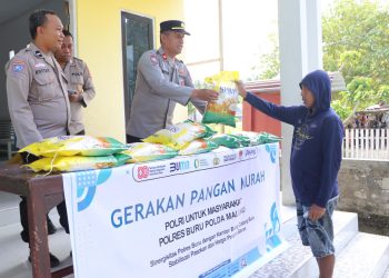 Polres Buru Gelar  Pangan Murah di Desa Lala