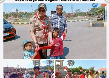 Bupati La Hamidi Sapa Warga dan Bagikan Bendera di Namrole